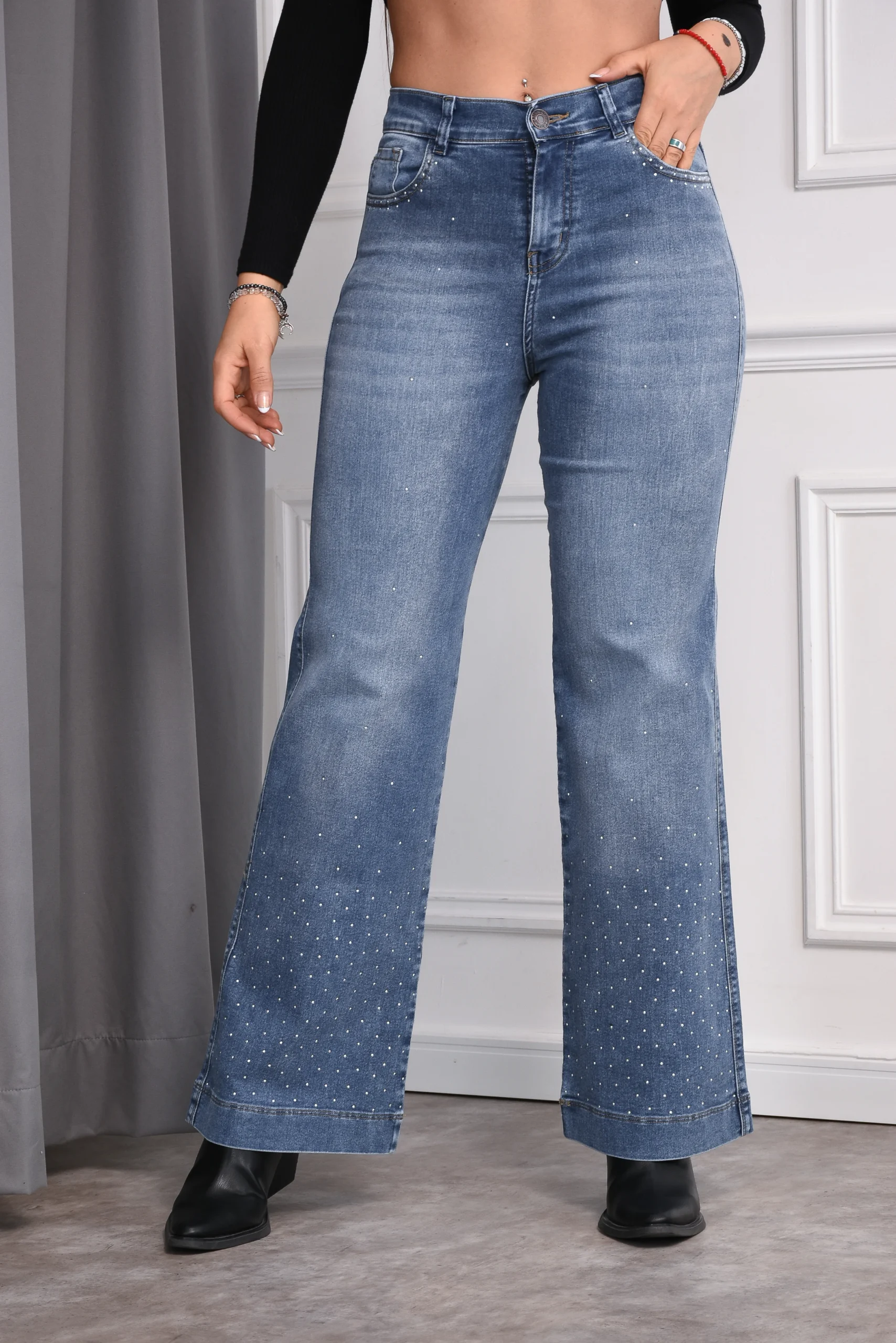 Pantalón wide leg de denim elastizado tiro alto